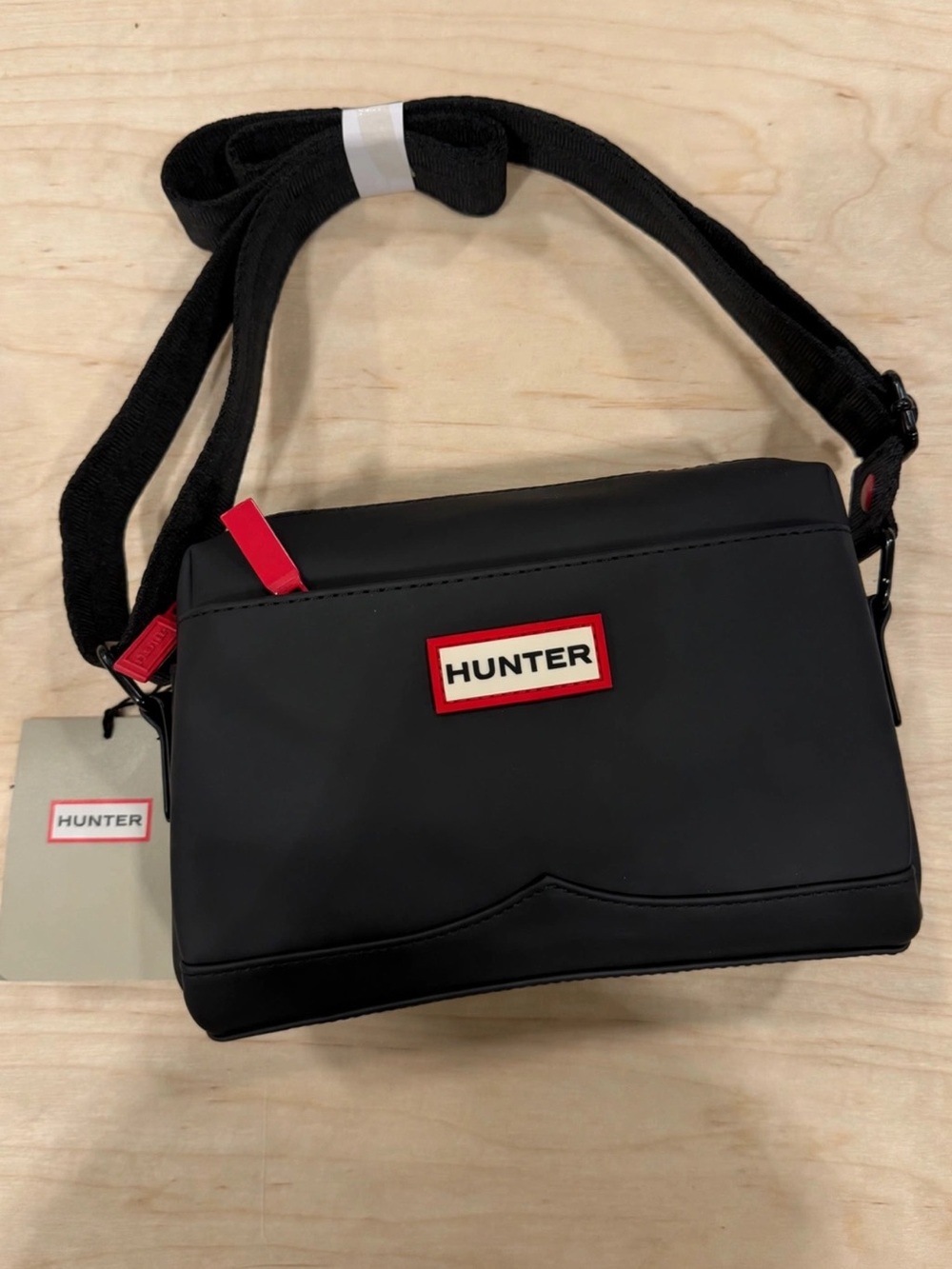 Hunter Black Messenger Bag with Red Logo Trim